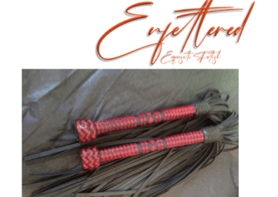 Enfettered plaited floggers red